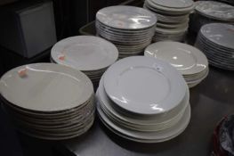 Large quantity of mixed serving plates