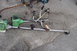 Two Flora Best petrol strimmers