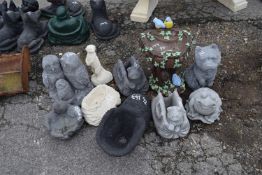 Ten composite garden statues to include cats, frogs, bird bath etc
