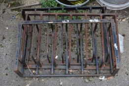 Three metal hay feeders