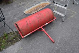 Roller attachment for a ride on mower