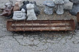 Iron feeder, width 108 x 25 cm approx