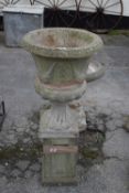 Composite garden urn on plinth, overall height approx 95cm, width approx 40cm