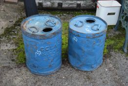 Two vintage oil drums