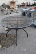 Metal garden table, height approx 75cm, width approx 105cm