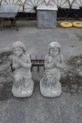 Pair of composite garden statues modelled as praying girls, height approx 70cm