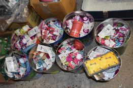 Eight buckets of Super Torches with names of boys and girls