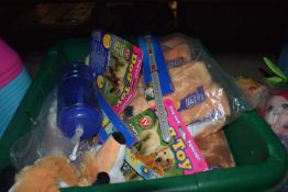 Large quantity of dog toys plus one bottle