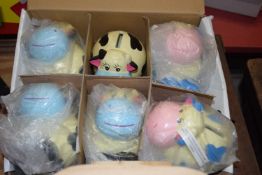 Quantity of six hand painted cow banks