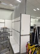 Large partition wall with shelving