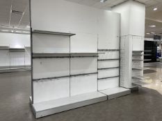 Large partition wall with shelving