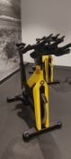 Technogym Yellow Spin Bike