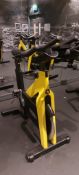Technogym Yellow Spin Bike