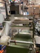 Semi-automatic bagger with Sick c2000 controls