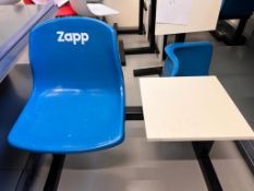 blue chair with adjoining table