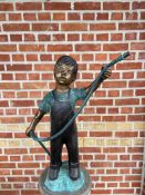 CAST BRONZE FIGURE DEPICTING A BOY HOLDING A HOSE
