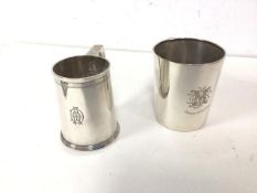 An Edwardian Chester silver presentation mug (9cm), a 1920s Birmingham silver mug (combined: 285g)