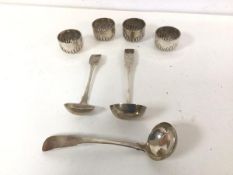 An 1815 Scottish silver ladle, a Georgian silver ladle and a set of five London silver gadrooned