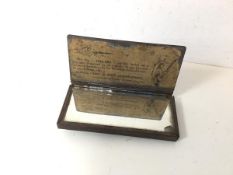 A WWI trench vigilant bayonet fitting mirror with original paper label (9.5cm x 4.5cm)