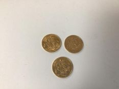 A group of three gold sovereigns, 1896, 1904 and 1911
