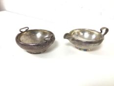 A sterling silver jug, with matching two handled bowl, both with monogram A.E.B. (300g)