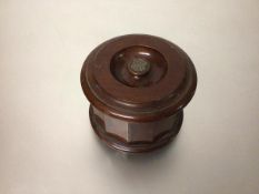 A Dunhill Airtight Patented mahogany tobacco jar of octagonal form, with white metal mounted