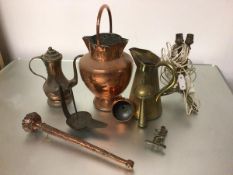 A copper twin spouted hammered finish water ewer with loop handle to top (40cm x 22cm), a brass rose
