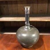 A Bidri silver inlaid vase, Indian 19thc. of flask form, with slender tapering neck with floral