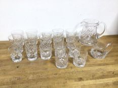 An assortment of cut crystal and glass tumblers, some marked Edinburgh, Scotland to base, with two