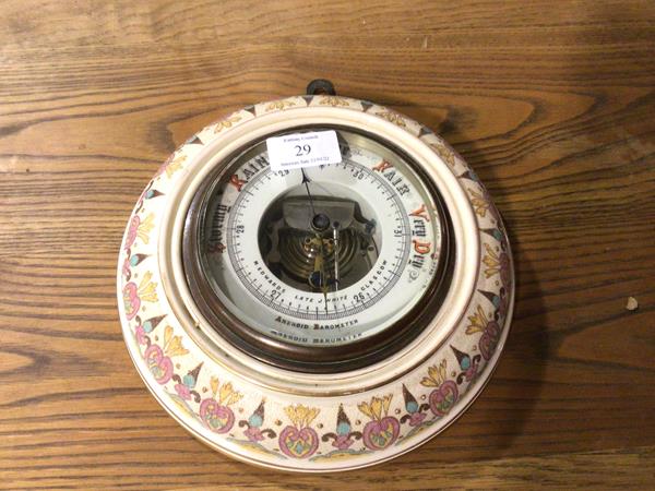 An Edwardian aneriod wall barometer, retailed by M. Edwards, Glasgow, with enamelled dial with