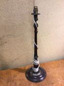 A 1920s/30s table lamp, with tapering fluted body on circular dished base (60cm)