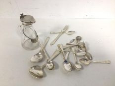 A small jug with Birmingham silver lid (10cm) and silver whisky label, and an assortment of silver