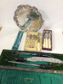 A mixed lot including a horn handled carving set with silver collars, an Epns footed salver, an