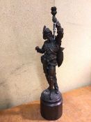 A cast metal sculptural table lamp of a Conquistador (75cm to top of lampholder)