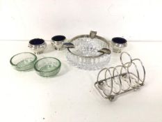 A mixed lot of silver and glass including a toastrack (63g), a cut glass ashtray with silver
