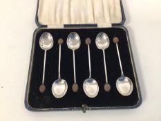 A boxed set of six 1920s Birmingham silver coffee bean spoons