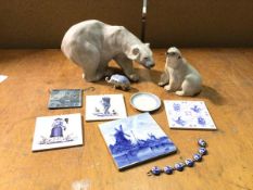 A Royal Copenhagen polar bear (losses and repairs) (16cm x 30cm x 16cm), another polar bear, stamped