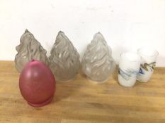 A set of three flame glass shades (each 18cm) and a cranberry etched glass shade, a further set of
