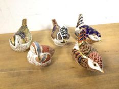 A group of four Royal Crown Derby bird figures, including a Teal Duckling, a Crested Tit (tallest: