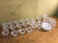 Assorted glassware including eleven sorbet glasses (8cm x 10cm), twelve champagne coupes, plates,