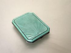 A George VI silver and engine-turned enamel powder compact, Deakin & Francis, Birmingham 1946, of
