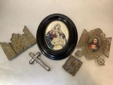 A group of devotional objects, 19th century and later, comprising: an Orthodox brass triptych
