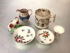 A group of English early 19th century ceramics comprising: a Leeds pink lustre cream jug, moulded in