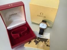 Omega, a gentleman's 9ct gold wristwatch, the silvered dial of oblong 