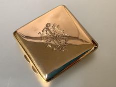 A George V 9ct gold cigarette case, Birmingham 1918, of plain rectangular form, the cover engraved