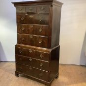 A mahogany chest on chest, mid-18th century, the cavetto moulded cornice over three short and