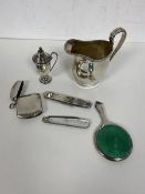 A group of silver objects including a late 19thc Chester silver milk jug measures 9cm high along