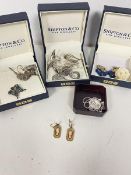 A pair of 1920's / 30's 9ct gold drop earrings with shell cameos combined weight 2.25grammes also