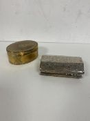 A white metal hinged box possibly continental with foliate sea scroll and drum decoration