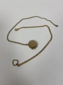 A 9ct gold belcher chain with gilt metal heart pendant measures 25cm and another chain marked 9ct
